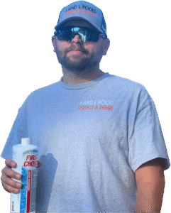 j and l polols technician holding a bottle of first choice pool chemicals